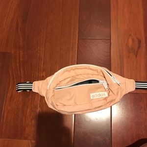 pink and striped adidas fanny pack